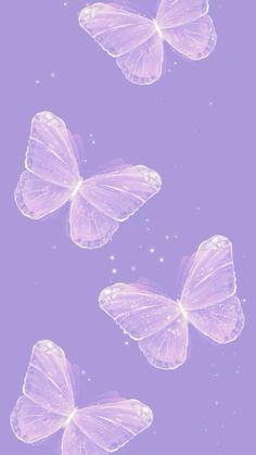 three pink butterflies flying in the sky with stars on it's back and purple background