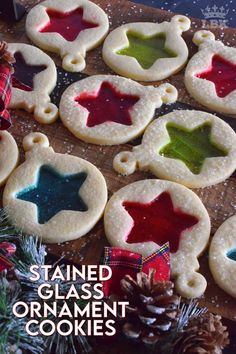 stained glass ornament cookies on a wooden table