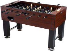 the foosball table is made from wood and metal