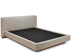 an upholstered bed frame with a black mattress on the bottom and back side