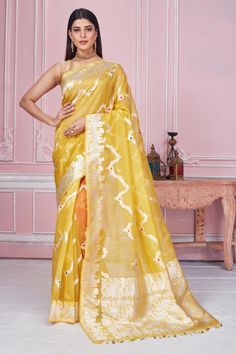 Shop yellow Banarasi saree online in USA with zari minakari work. Look your best on festive occasions in latest designer saris, pure silk sarees, Kanjivaram silk sarees, handwoven saris, tussar silk sarees, embroidered saris from Pure Elegance Indian fashion store in USA.-full view Semi-stitched Yellow Meenakari Saree, Semi-stitched Yellow Banarasi Silk Saree, Semi-stitched Yellow Saree With Printed Border, Yellow Semi-stitched Banarasi Silk Pre-draped Saree, Yellow Katan Silk Pre-draped Saree, Fashion Journals, Tussar Silk Saree, Traditional Fabric, Banarasi Sarees