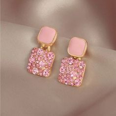 Title: Pink Rhinestone & Enamel Drop Earrings - Msrp $40 Description: Add A Touch Of Sparkle With These Chic Pink Rhinestone And Enamel Drop Earrings. Featuring A Blend Of Soft Pink Enamel And Vibrant Rhinestones Set In Gold-Tone Metal, These Earrings Are Perfect For Both Casual And Dressy Occasions. The Unique Geometric Design Offers A Modern Flair That Will Complement Any Look. Condition: New In Package (Nip) Size: 2.4 Cm X 1.2 Cm Materials: Rhinestones, Enamel, Gold-Tone Metal Msrp: $40 Make Shein Jewelry, Pink Enamel, Chic Pink, Pink Rhinestones, Gold Tone Metal, Geometric Design, Beautiful Earrings, Soft Pink, Color Pop