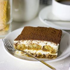 a piece of cake sitting on top of a white plate