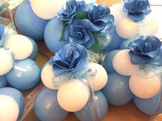 blue and white balloons with roses on them