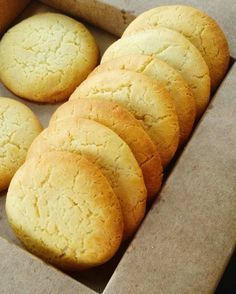 a box filled with cookies sitting on top of a table