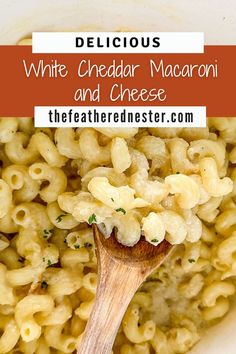 white cheddar macaroni and cheese with a wooden spoon