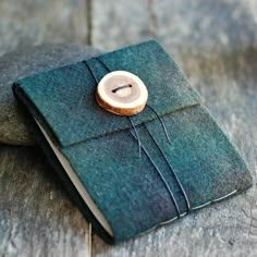 a book with a wooden button on it