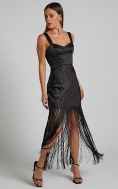 'Step into the spotlight in our Eiren Corset Bodice Tiered Fringe Detail Maxi Dress In Black. This show-stopping piece is perfect for any occasion, from a fancy cocktail party to a formal wedding. The sweetheart neckline and sleeveless design accentuate your curves while the tiered fringe detailing adds playful movement with every step you take. Made of high-quality materials, this dress will have you feeling confident and stylish all night long. Whether you're hitting the town or attending an e Fancy Cocktail Party, Corset Bodice, Feeling Confident, Every Step You Take, Formal Wedding, Corset Dress, Sweetheart Neckline, Cocktail Party, Bodice