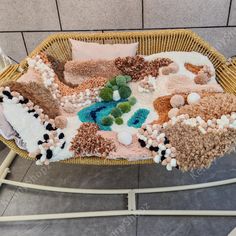 a basket filled with lots of stuff on top of a floor