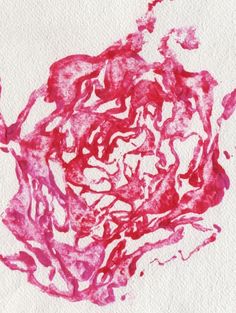 an abstract painting with red ink on white paper