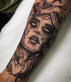 a woman's arm with a tattoo on it