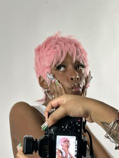 Pink pixie cut 💁🏾‍♀️ Light Pink Pixie Cut, Hot Pink Pixie Cut, Pink Pixie Cut Black Women, Pink Pixie Hair, Pink Hair Black Women, Dyed Pixie Cut, Pink Pixie Cut, Pink Pixie, Light Pink Hair