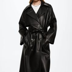 Faux Leather. Oversize Design. Long Design. Lining Only. Side Pockets. Shirt-Style Collar. Button Up. Lace Fastening. Inner Lining. Women Coats Trench Coats Material And Washing Instructions Composition: 100% Polyester. Lining: 100% Polyester. Coating: 100% Polyurethane Longline Trench Coat, Long Winter Jacket, Coat Trends, Long Coat Women, Leather Trench, Belted Trench Coat, Trench Coat Black, Leather Trench Coat, Long Winter