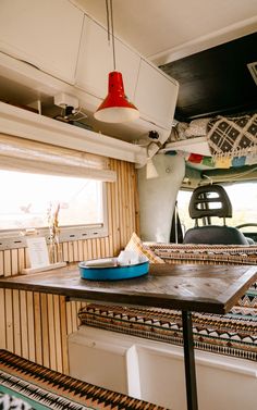 the inside of a camper with lots of furniture