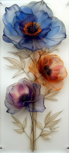 three blue and orange flowers on a white background