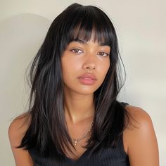 Blunt bangs are a timeless trend that adds a bold touch to any hairstyle. These straight-cut bangs, falling just above the eyebrows, can be paired with short, medium, or long hair. Keep the rest of your hair straight and sleek for a refined look, or create soft waves for a contrasting style. Check out these chic blunt bangs inspirations! #BluntBangs #BoldBangs #ChicHair #HairInspiration #SleekHair #SoftWaves #ModernHairstyle #HairGoals #TimelessStyle #BluntBangs #BoldBangs #ChicHair #HairInspiration #SleekHair #SoftWaves #ModernHairstyle #HairGoals #TimelessStyle #ChicStyle #HairInspo #SleekAndStraight #ModernBangs #HairTransformation #TimelessBeauty Bangs In Straight Hair, Full Bangs Layered Hair, Long Straight Hair And Bangs, Flat Bangs Hairstyle, Haircuts Straight Hair Bangs, Bangs Over Eyebrows, Shoulder Hair Bangs, Bangs With Brown Hair, Haircuts For People With Long Faces