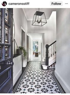 the hallway is decorated in black and white