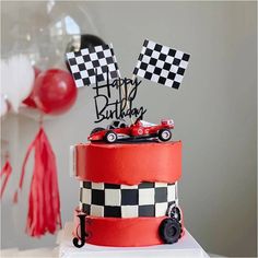 a red and black birthday cake with race cars on the top, happy birthday card