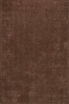 an area rug with brown colors