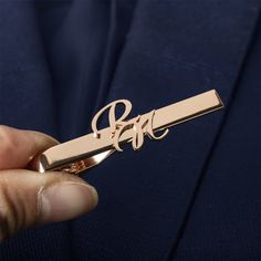 Introducing our Personalized Tie Clip, the perfect accessory for the modern man. Handcrafted with precision, this tie clip is not only a functional piece of attire but also a meaningful keepsake. It is an ideal choice for wedding gifts, anniversary gifts, and a heartfelt present for dad. This tie clip is more than just a piece of men's fashion, it's a of style, sophistication, and sentimentality. This tie clip is meticulously made from high-quality stainless steel that ensures durability and lon Best Man Gifts, Groomsmen Tie, Personalized Tie Clip, Man Gifts, Groomsmen Ties, Personalized Tie, Proposal Box, Gifts Anniversary, Presents For Dad