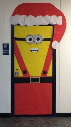 a door decorated to look like a santa clause