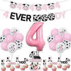 a cow themed birthday party with pink and white balloons, cupcakes and decorations