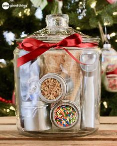 a glass jar filled with different types of condiments