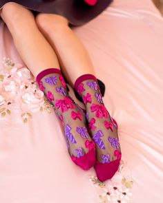 You can't have too many bows this year! Our elegant black sheer bow socks feature a variety of jewel toned bows to deck out your feet. We took this style to the next level with a giant black bow adorned at the back of the ankle, perfect for peeking out from your Winter boots. Add a feminine touch to your Valentine's Day outfit! One Size. Recommended fit US W5.5-10. 200 Needle Count. ✨ Funky yet elegant - no silly or childish patterns 🧦 Premium quality - durably made with comfortable stretch 👗 Fancy Socks, Bow Socks, Dita Von Teese Lingerie, Plus Size Tights, Sheer Socks, Blue Socks, Best Candy, Thigh High Socks, Fredericks Of Hollywood