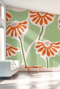 an orange flower wall mural in a living room