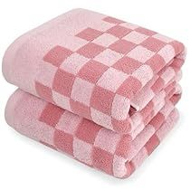 three pink checkered towels stacked on top of each other