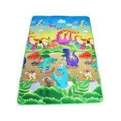 the children's play mat has dinosaurs on it