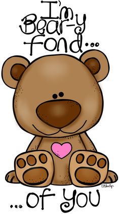 a brown teddy bear with a pink heart