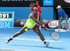 a female tennis player in action on the court