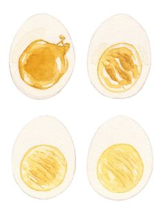 four eggs with different types of yellow paint on them