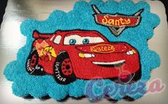 a birthday cake with cars on it