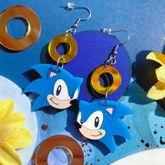 Joining the Chao lineup is the hedgehog himself featuring a golden acrylic ring 🦔 Standard version features a stainless steel hook and stainless steel durable Jumprings or you can swap to clip ons or thick steel huggies! Acrylic Ring, Golden Ring, The Hedgehog, Acrylic Earrings, Cool Items, Cute Earrings, Little Gifts, Jewelry Earrings Dangle, Etsy Earrings