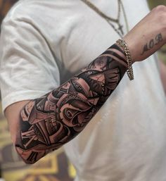 a man with a tattoo on his arm