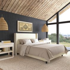 a bedroom with black walls and white furniture