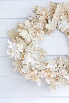 a wreath made out of old book pages