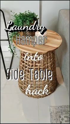 a table with a plant on it and the words laundry hamper into side table back