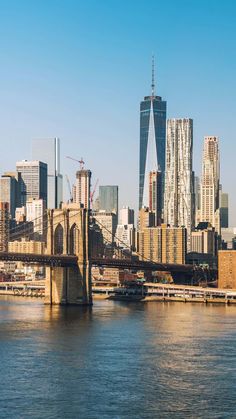 the skyline of new york city is seen from across the water