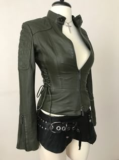 Subversive Outfits Aesthetic, Female Leather Outfit, Catwoman Inspired Outfit, Arcane Aesthetic Outfits, Green Punk Outfits, Leather Jackets Aesthetic, Fighter Clothes, Green Leather Jacket Outfit, Scifi Outfit