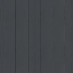 a dark gray wood paneled wall with vertical lines in the center and horizontal stripes at the bottom