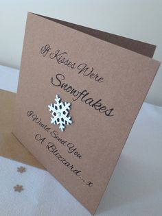 a brown card with a white snowflake on it