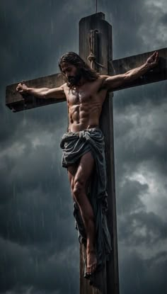 the crucifix is displayed in front of a cloudy sky with rain coming down on it