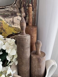 three vases sitting next to each other on a table