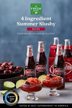 four bottles of fresh squeezed summer slushy on a table with cherries and limes