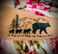 a bear and her cubs tattoo on the left inner arm, with an inscription that says as long as i'm going, my baby you'll be