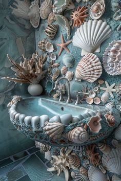 a bathroom sink surrounded by sea shells and seashells