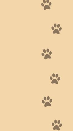 an image of dog paw prints on a beige background